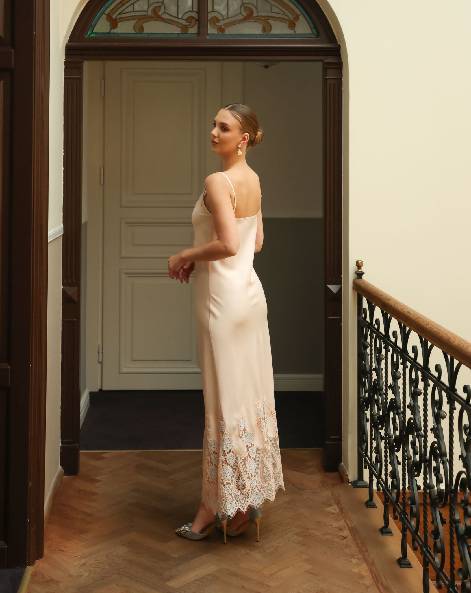 Back view of the floor-length nightgown, showcasing the smooth cotton-viscose blend and refined feminine lines.