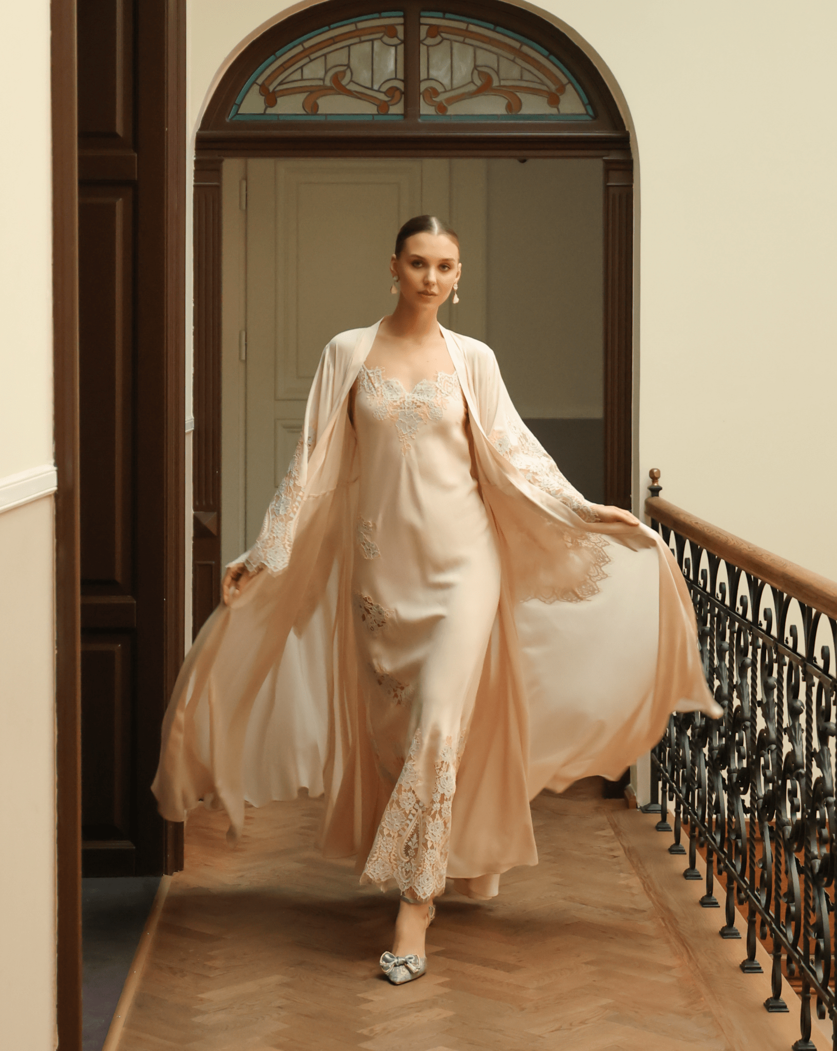 A flowing semi-sheer cotton Robe and Nightgown Set in motion, showcasing the light and airy fabric while walking.