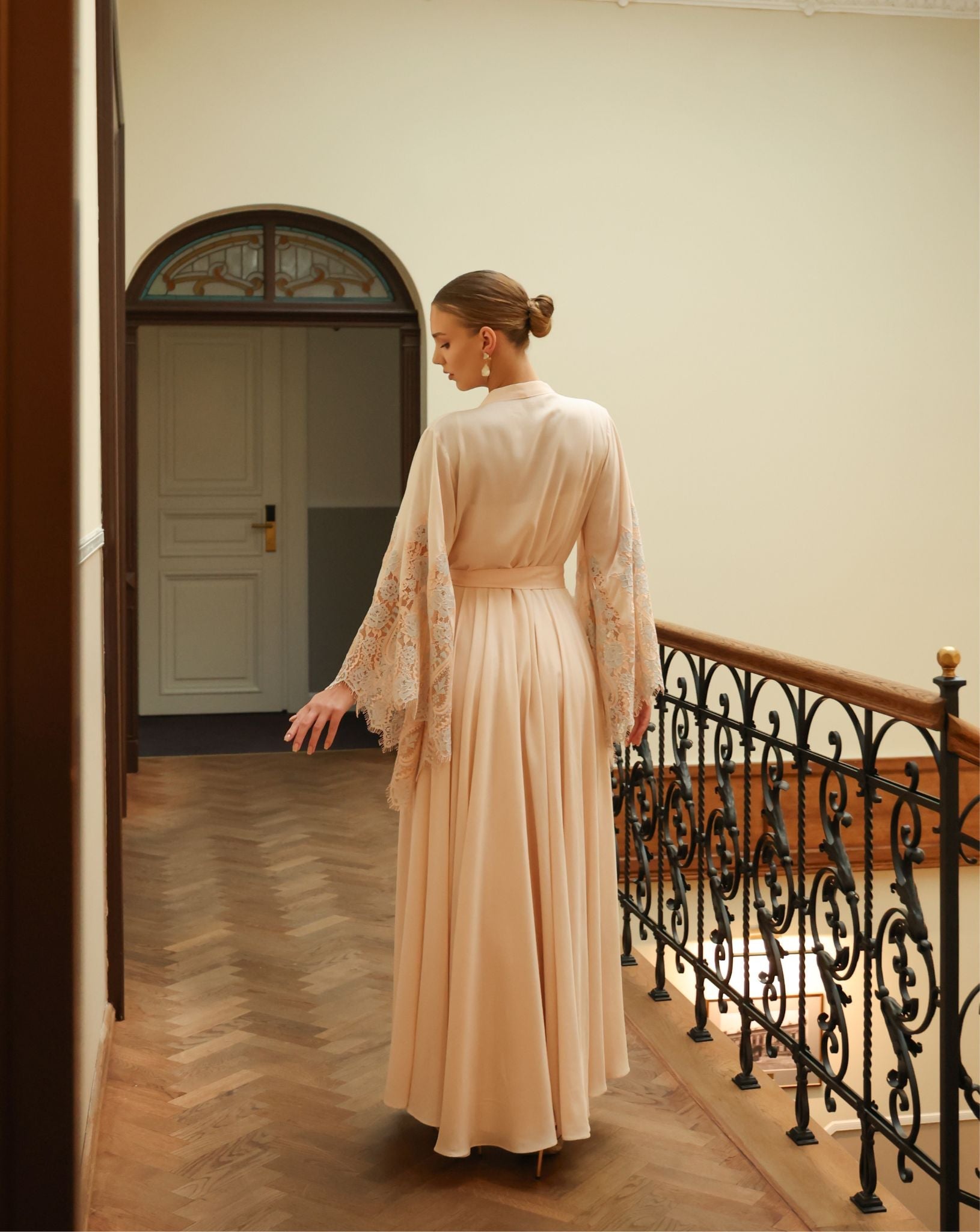 Full-length rear view of the belted cotton robe, emphasizing the sophisticated look and high-quality craftsmanship.