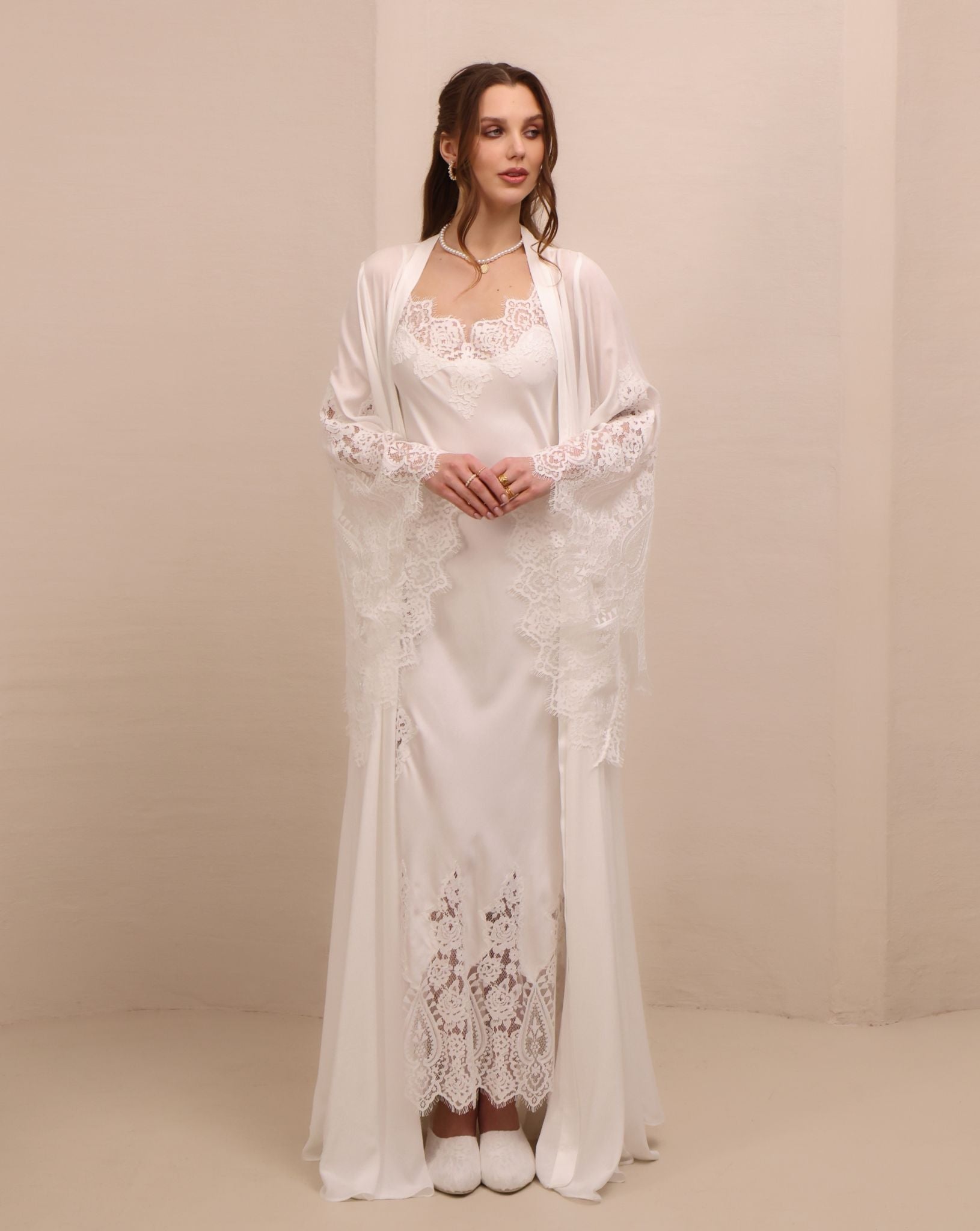 A serene static view of the open ensemble, showcasing the intricate lace along the wide, flowing sleeves.