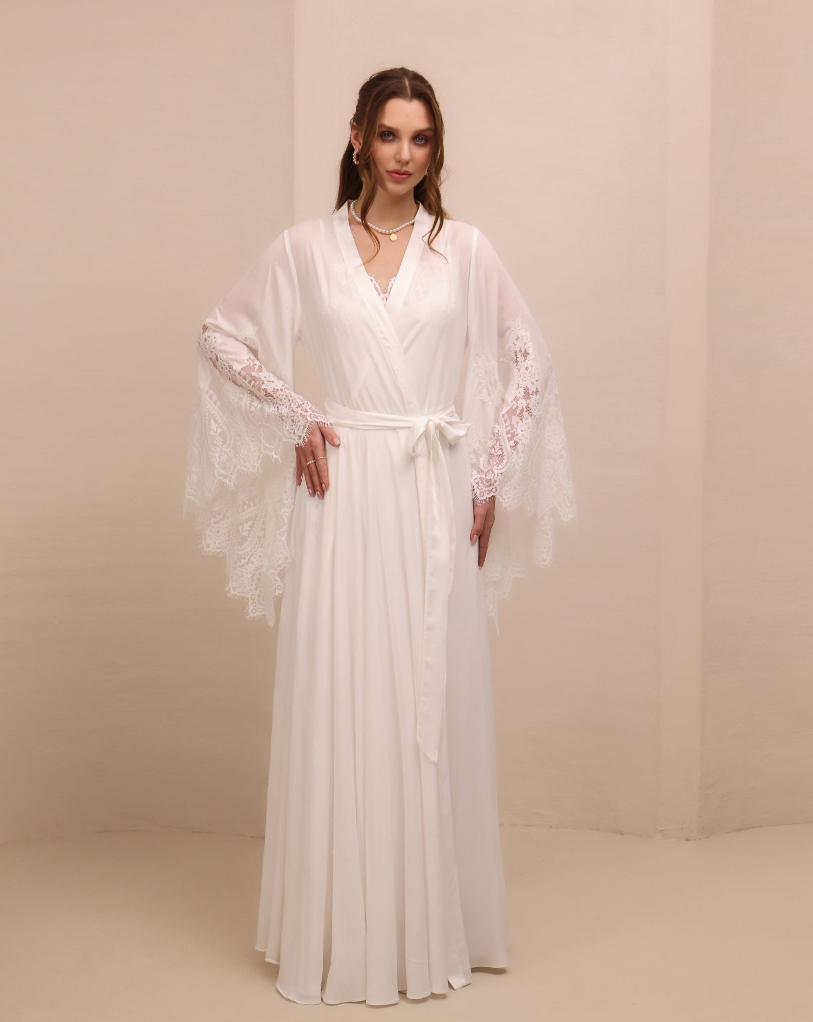 A poised frontal shot of the tied attire, illustrating a refined look and a graceful, timeless silhouette.