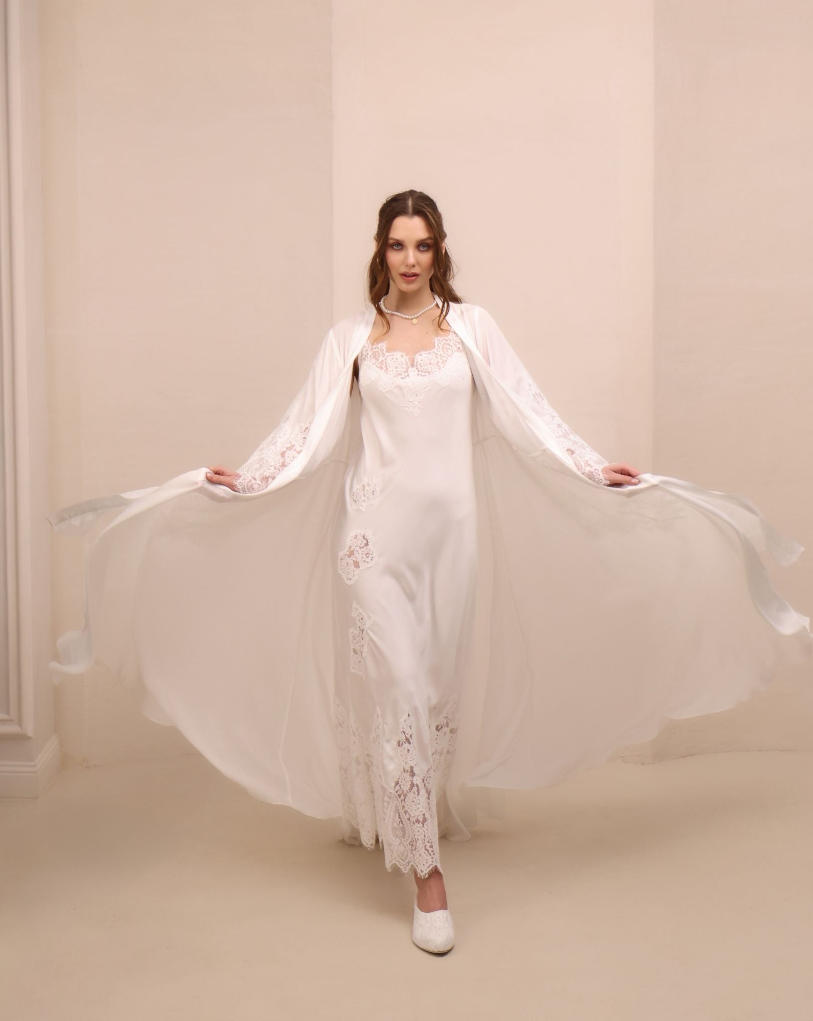 A dynamic motion shot of the Robe and Nightgown Set, capturing the light and airy feel of the semi-sheer fabric.