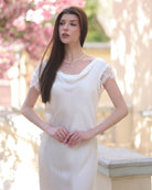 Mid-length shot of the silk nightgown, highlighting the flattering fit and refined feminine drape.