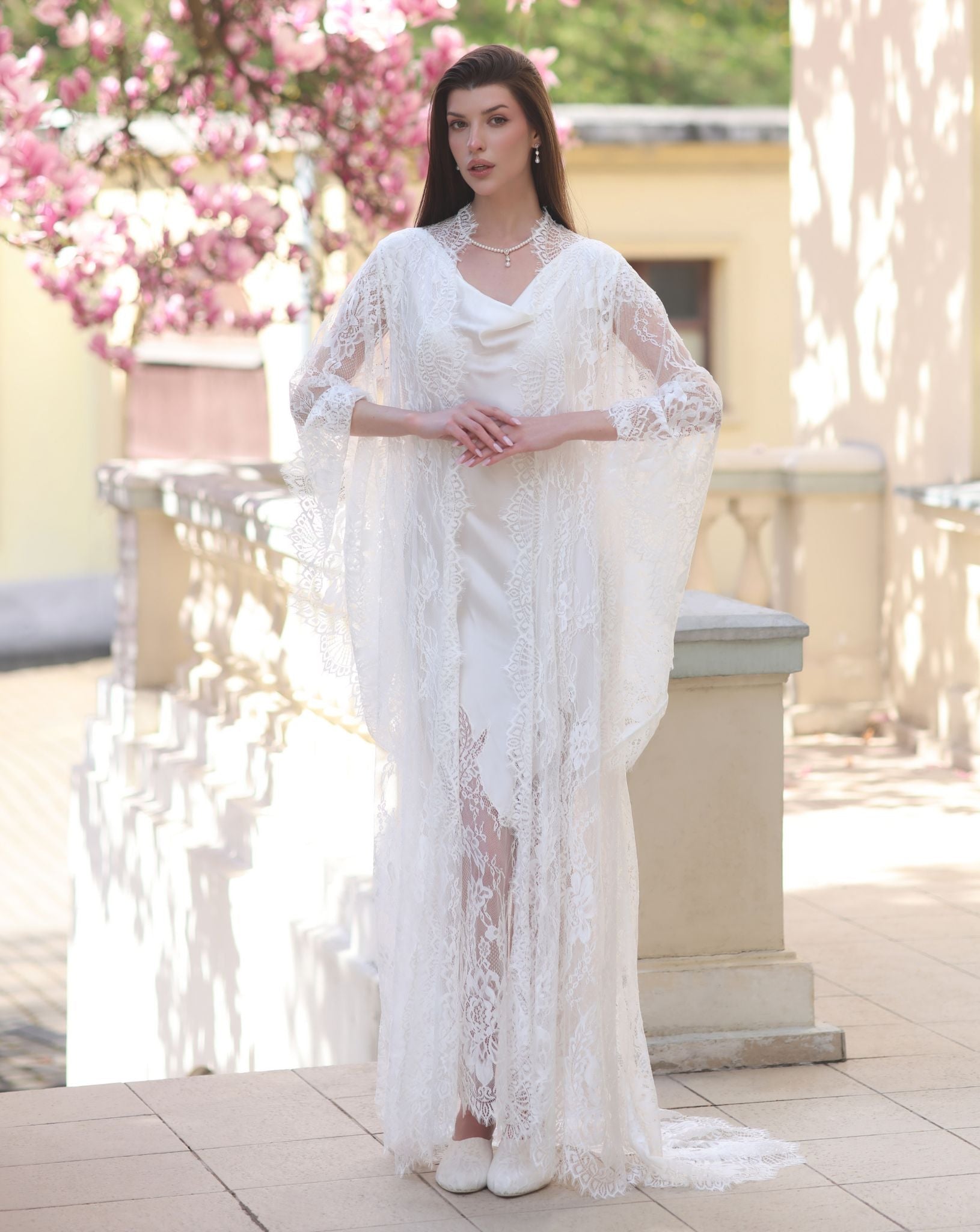 A serene static view of the ensemble, highlighting the elegant wrap-over style and clean neckline of the robe.