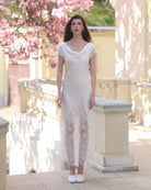 Frontal view of the silk nightgown, illustrating the smooth, flowing silhouette and lace-trimmed hem.
