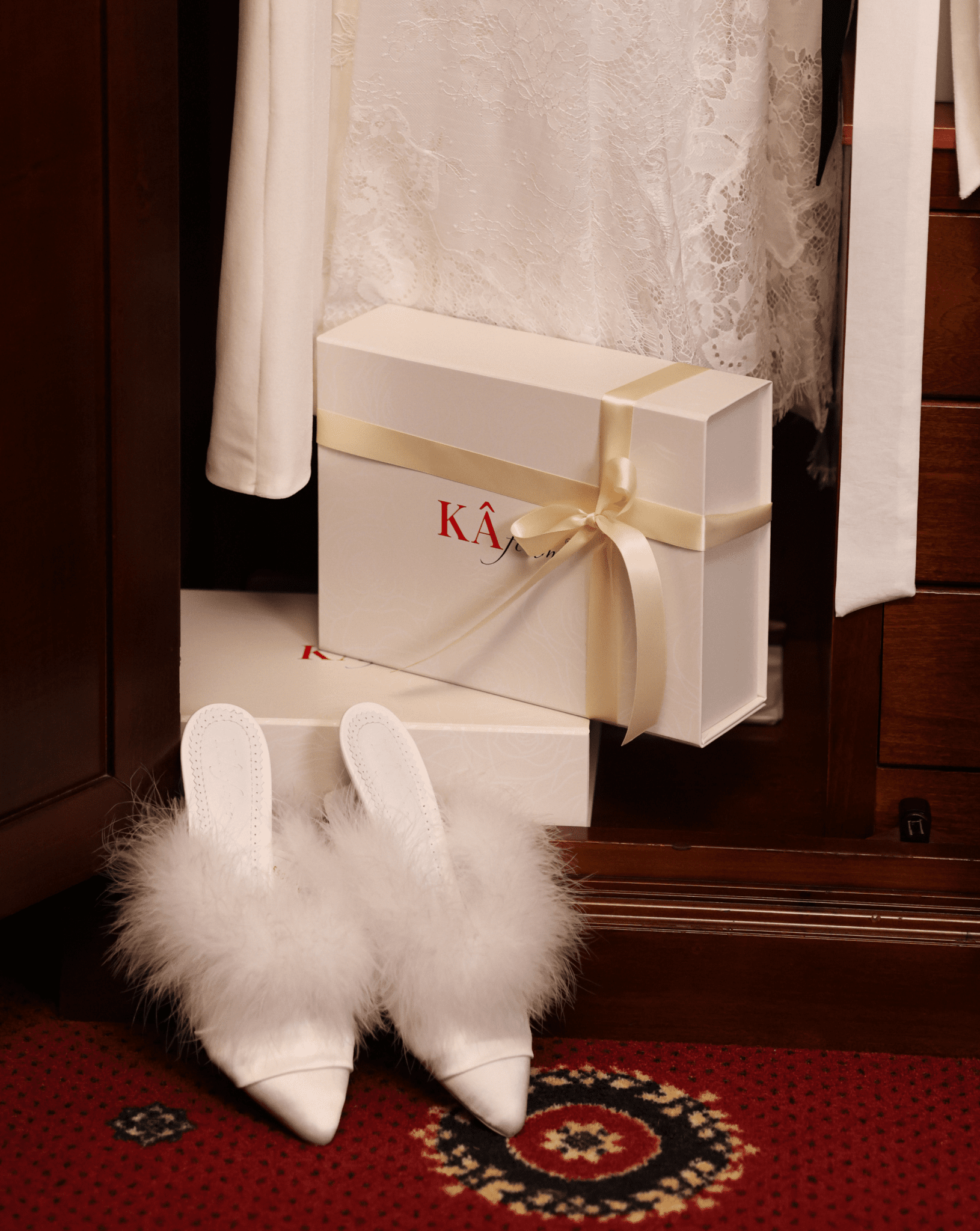 Creative shot of the elegant footwear near branded boxes, capturing a whisper of glamour for the modern muse.
