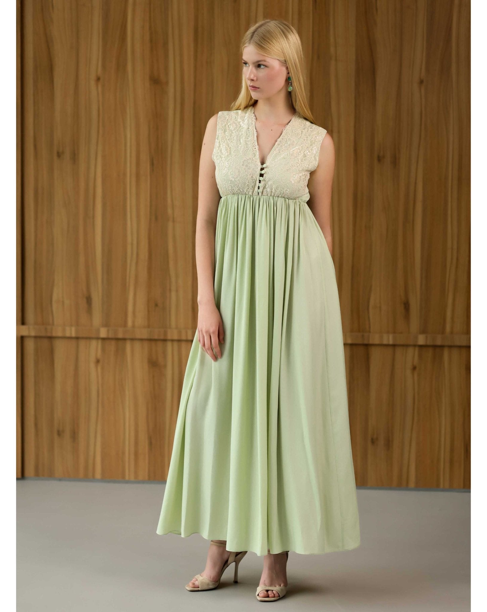 Frontal view of the sleeveless nightgown, featuring a soft elastic band under the bust for a comfortable, adaptive fit.