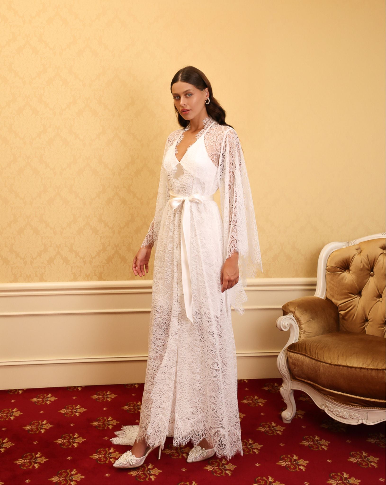 Side view of a luxury silk and lace ensemble, highlighting the refined textures and sophisticated feminine silhouette.