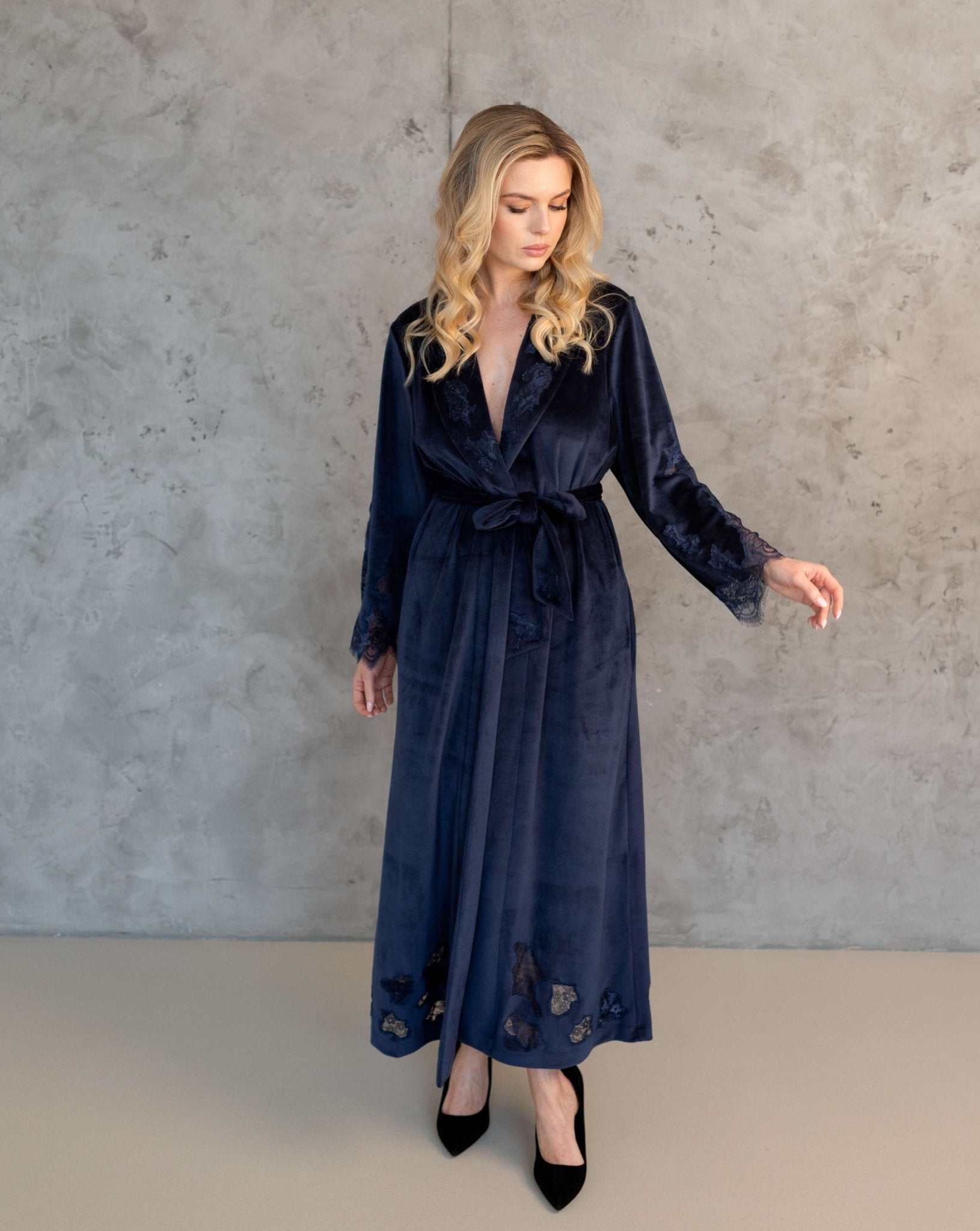 Blue Velvet Kimono in full length with delicate lace trim on the sleeves and a matching belt at the waist.