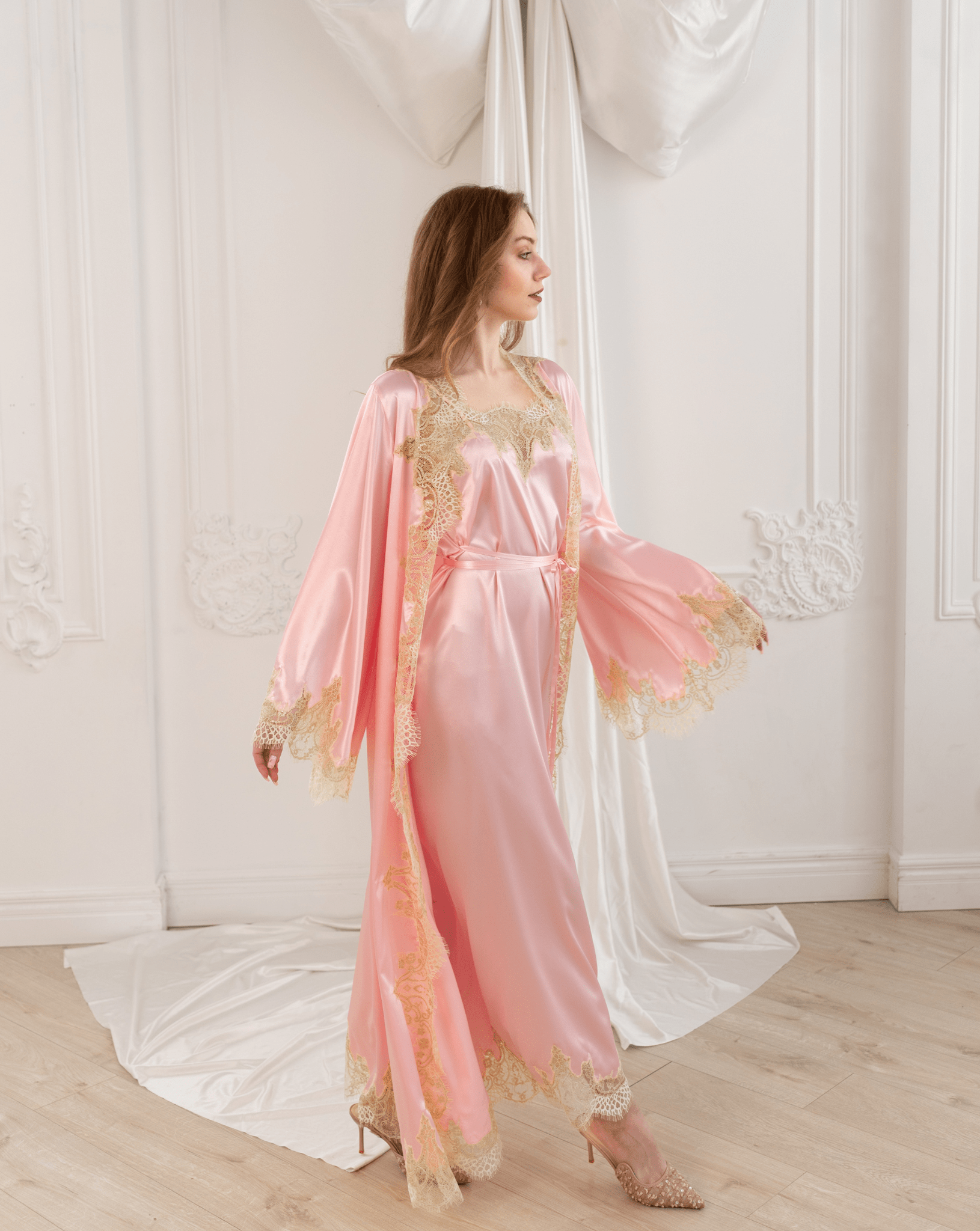 Capturing the ensemble in a gentle spin, illustrating how the light layers move gracefully with every step.