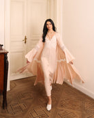 A dynamic view of the flowing set in motion, showcasing its airy silhouette and effortless grace during movement.