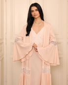 Mid-length shot showing the sleeve details and the light, reassuring feel of the material against the skin.