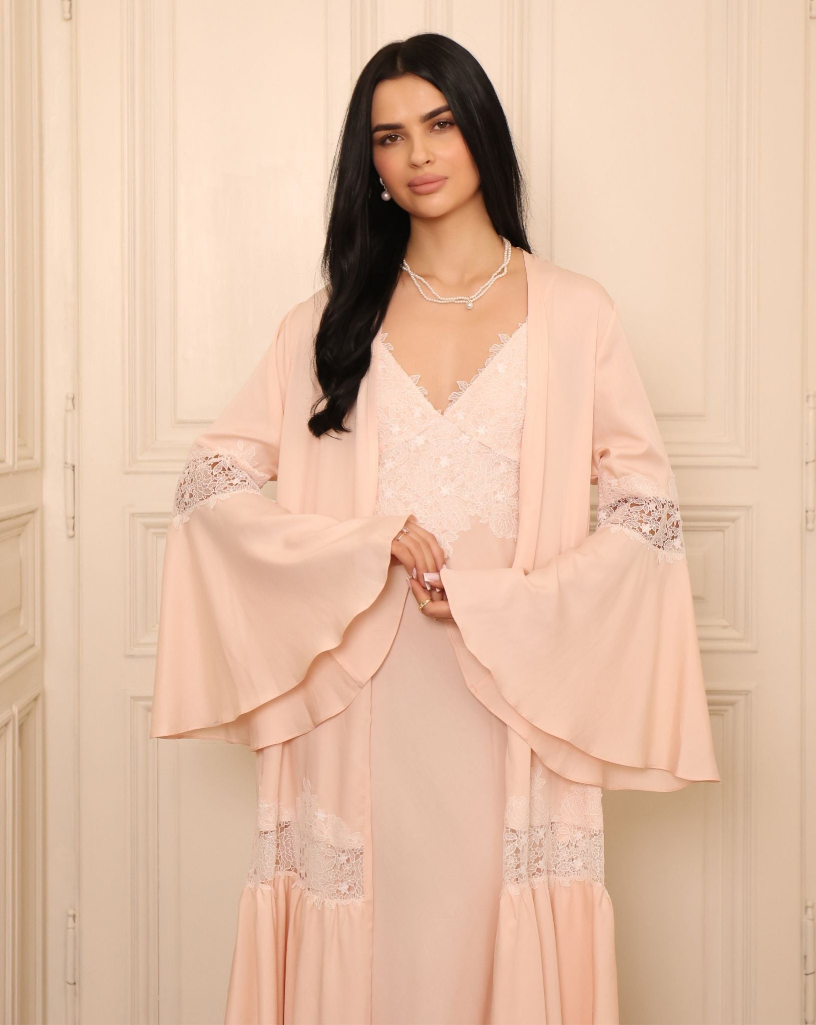 Mid-length shot showing the sleeve details and the light, reassuring feel of the material against the skin.