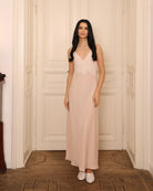 Frontal view of the cotton-viscose slip dress, featuring delicate lace detailing along the feminine neckline.