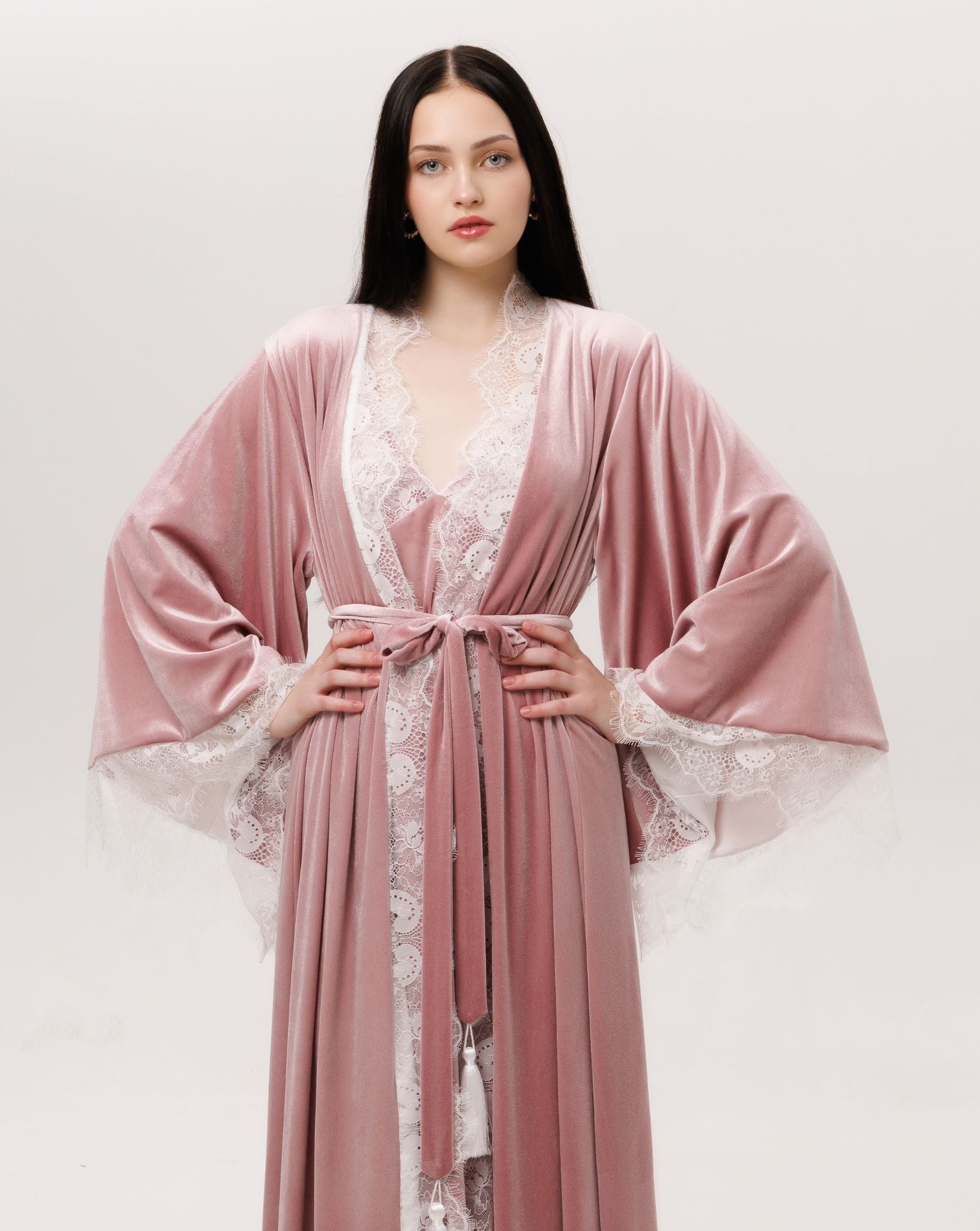 A mid-length view with hands on the waist, showcasing the luxurious essential for quiet, sensual moments.