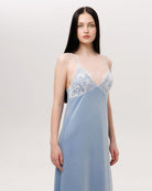 Mid-length frontal view of the nightdress, highlighting the regal presence and the soft drama of the fabric.