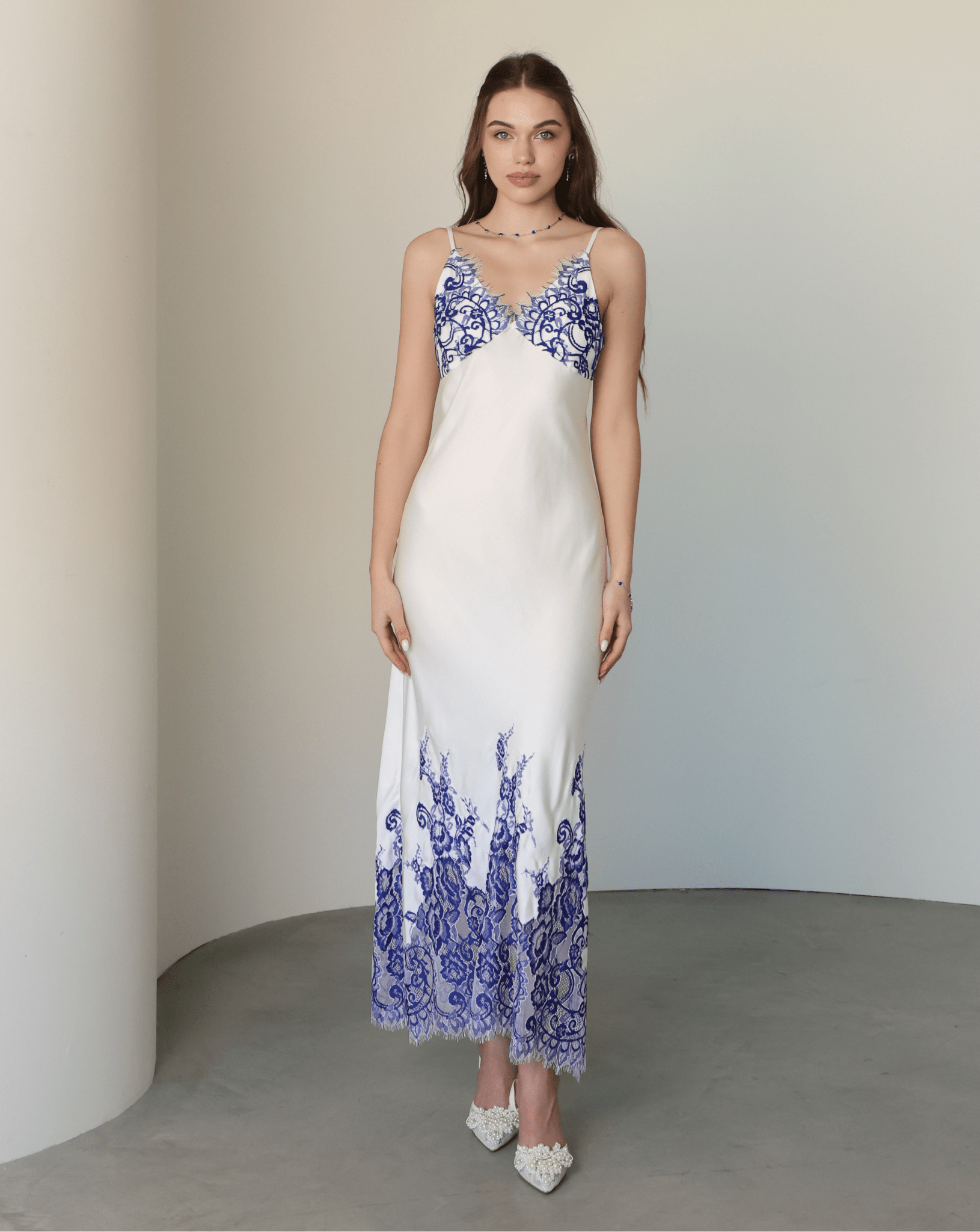 Frontal view of the nightdress with lace detailing at the neckline and a comfortable, non-padded design.