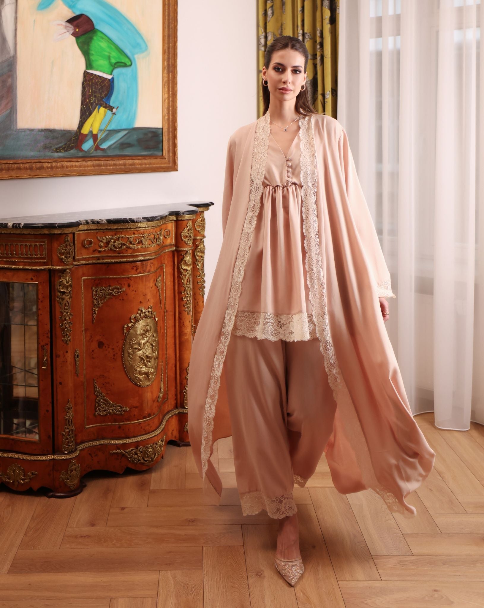A full-length shot of the three-piece ensemble in motion, showcasing the flowing robe and breathable cotton fabric.