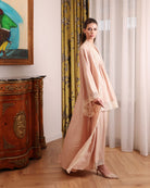 A side perspective of the complete layered set, illustrating the effortless comfort and timeless charm of the design.