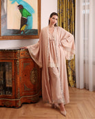 A serene shot of the cotton pajama set, capturing a mood of quiet beauty and relaxation at home.