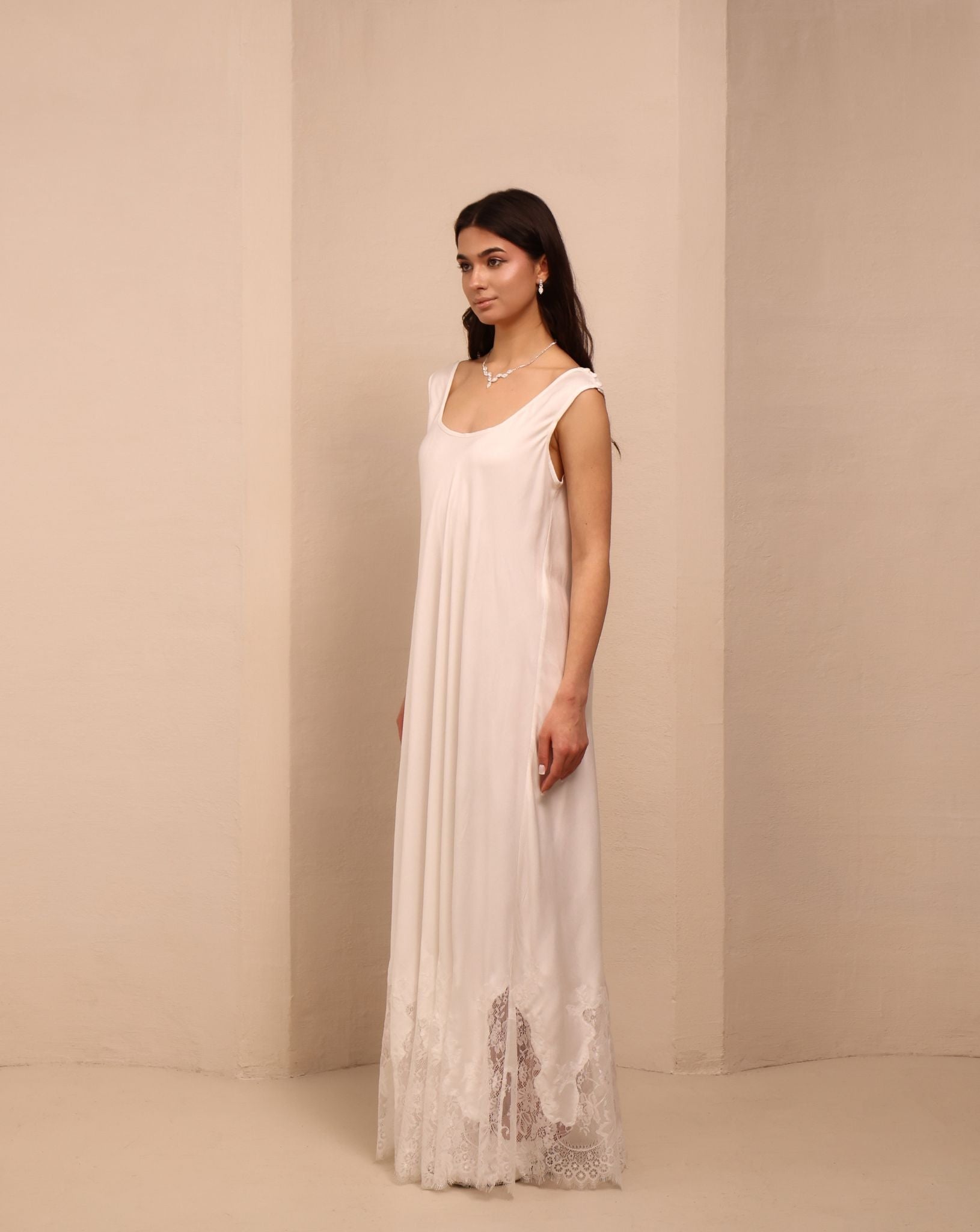 Side view of the white Robe and Nightgown Set dress, designed to support you through every stage of motherhood.