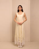 Frontal shot of the vanilla nightdress, featuring discreet shoulder buttons for effortless breastfeeding access.