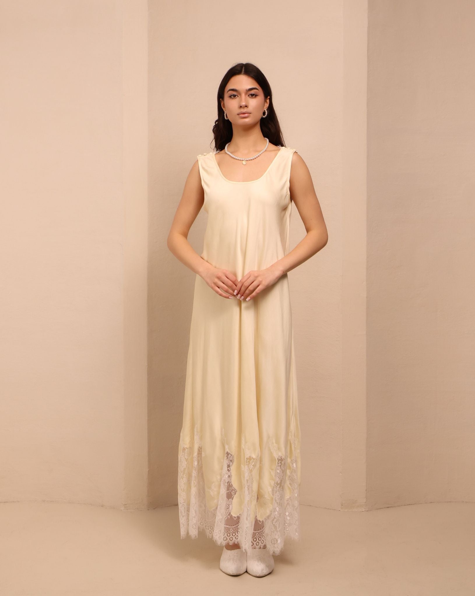 Frontal shot of the vanilla nightdress, featuring discreet shoulder buttons for effortless breastfeeding access.
