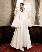 Full-length view of the Velvet Robe and Nightgown Set in motion, capturing its regal and flowing silhouette.