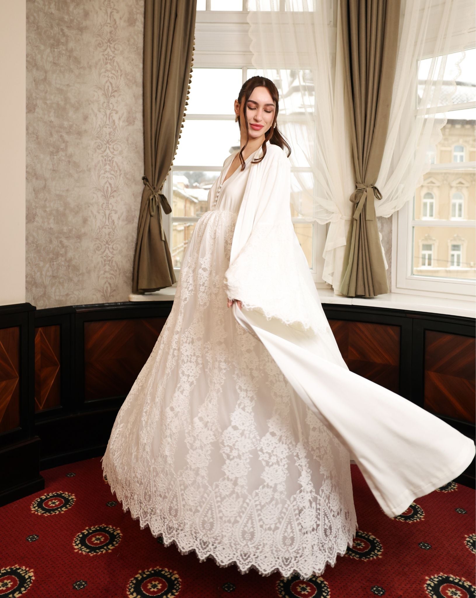 A dynamic, "flying" shot of the Velvet Robe and Nightgown Set, celebrating its visual poetry and lightness.