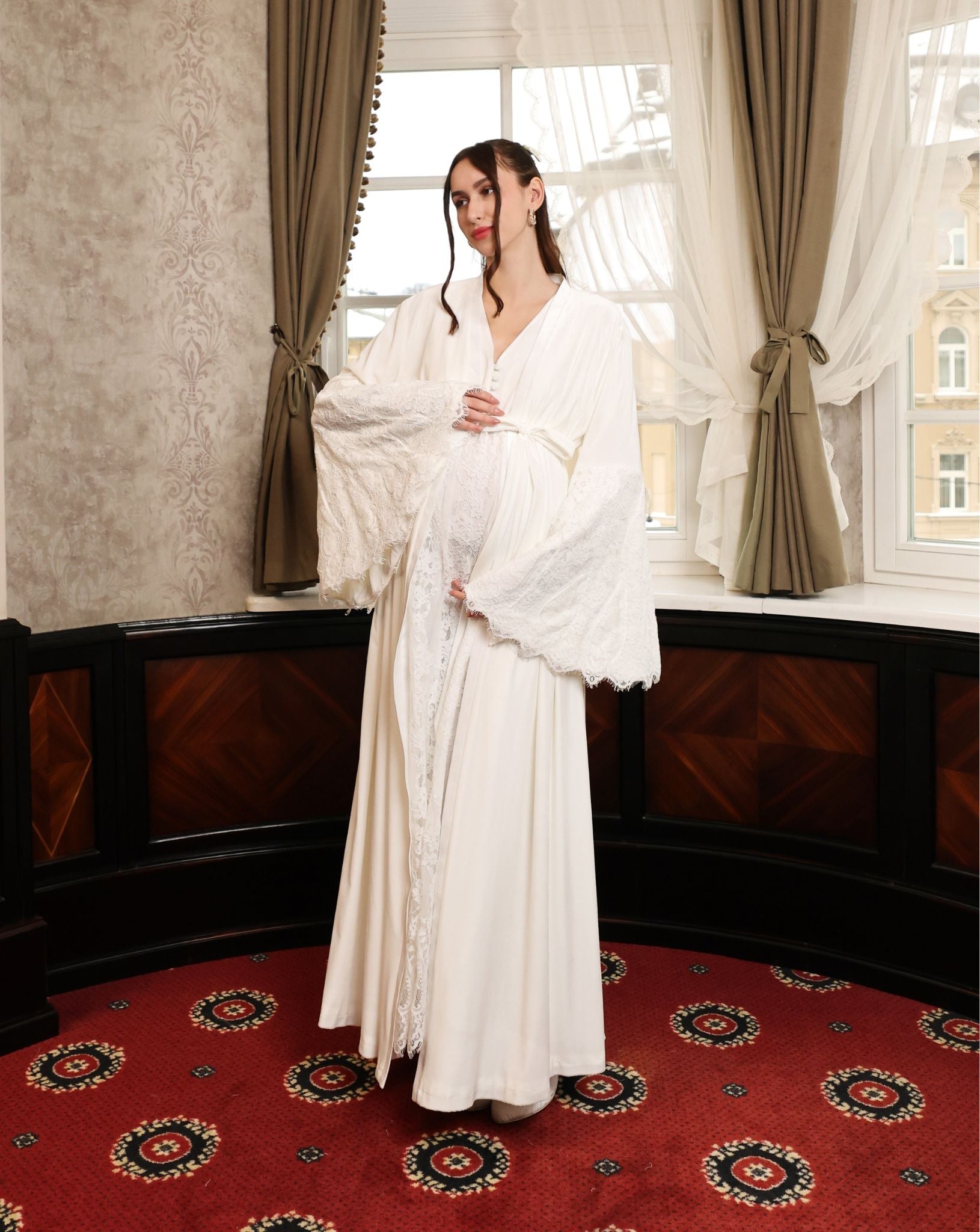 Side view of the floor-length velvet ensemble, emphasizing full coverage and a graceful, timeless silhouette.