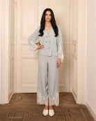 A poised frontal view of the two-piece lounge set, highlighting the relaxed fit and elegant, clean lines.