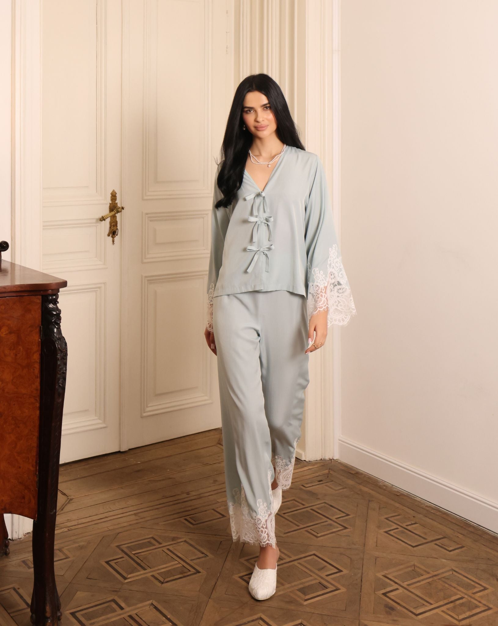 A full-length motion shot of the Pajama Pants and Top, showcasing the fluid viscose and breathable comfort.