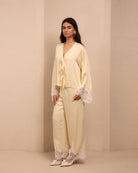 Side view of the set, highlighting the relaxed fit and the elegant, natural silhouette of the nightwear.