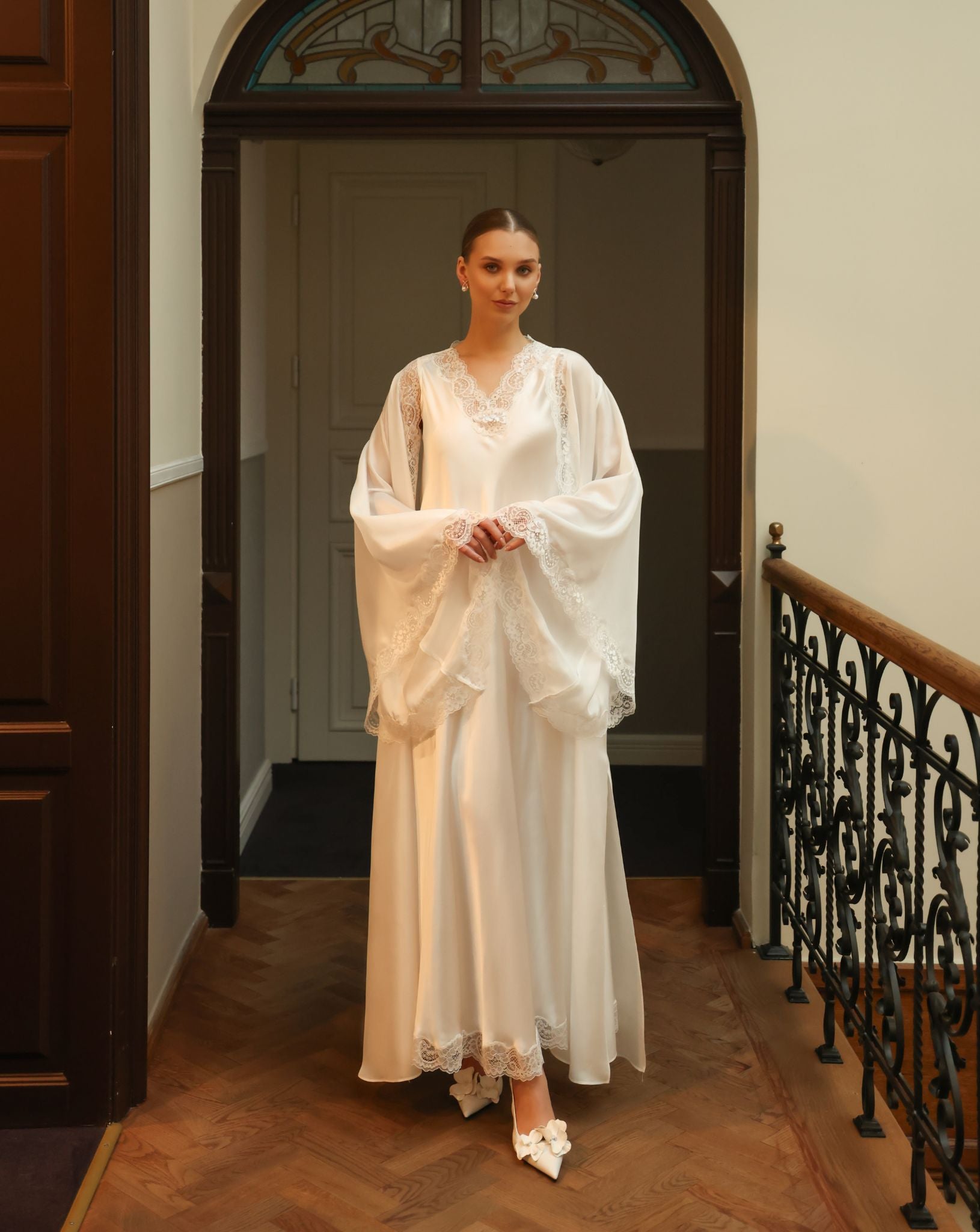 Silk Robe and Nightgown Set with hands held together to display the exquisite wide sleeves trimmed with fine lace.