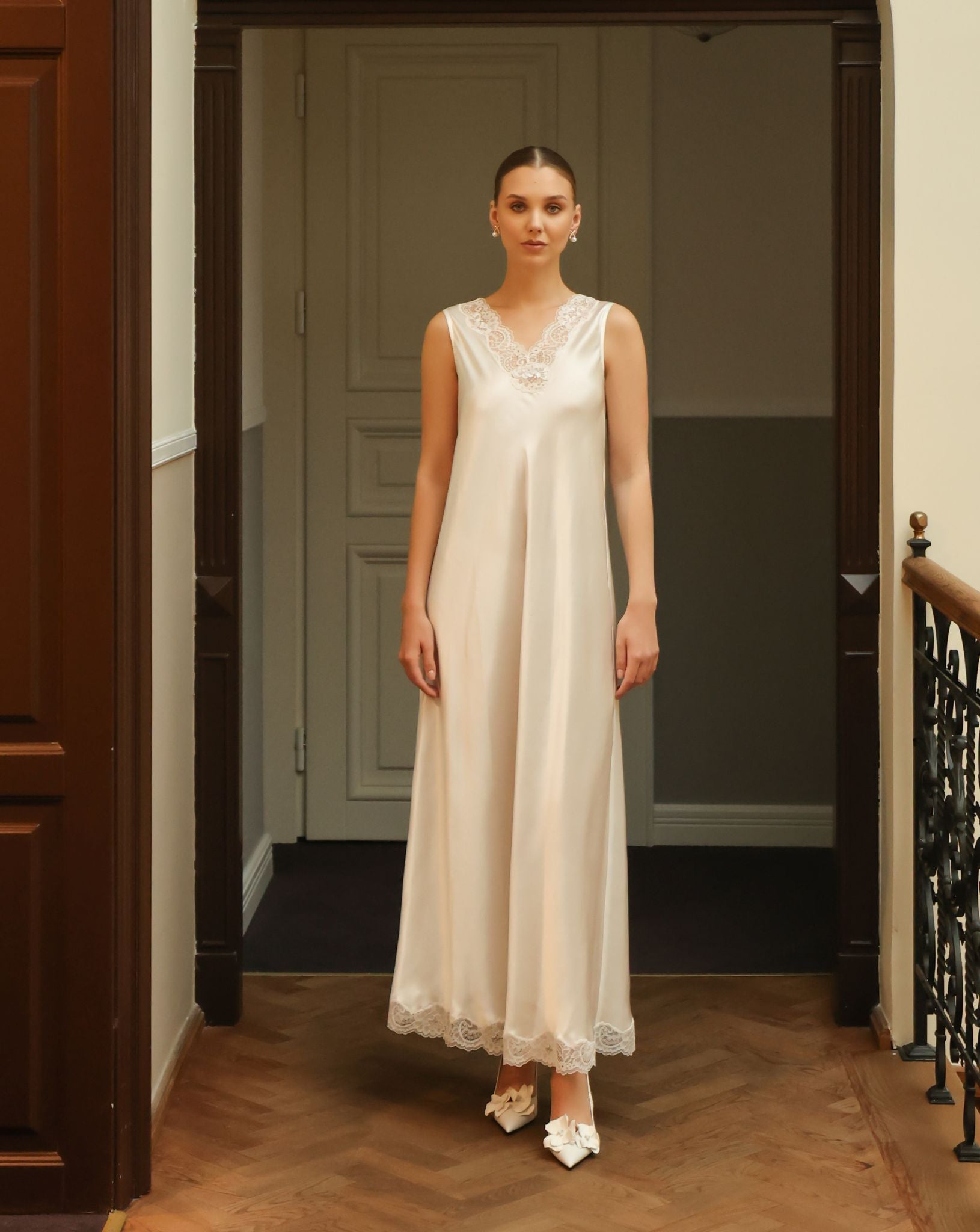 Front view of the floor-length white nightdress, highlighting the relaxed silhouette and high-quality mulberry silk.