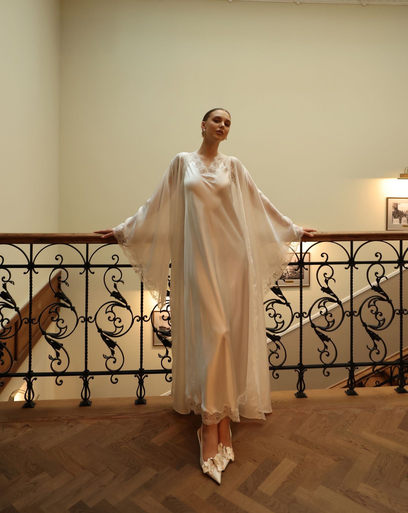 Graceful pose showcasing the understated elegance and sophisticated style of the 100% mulberry silk collection.