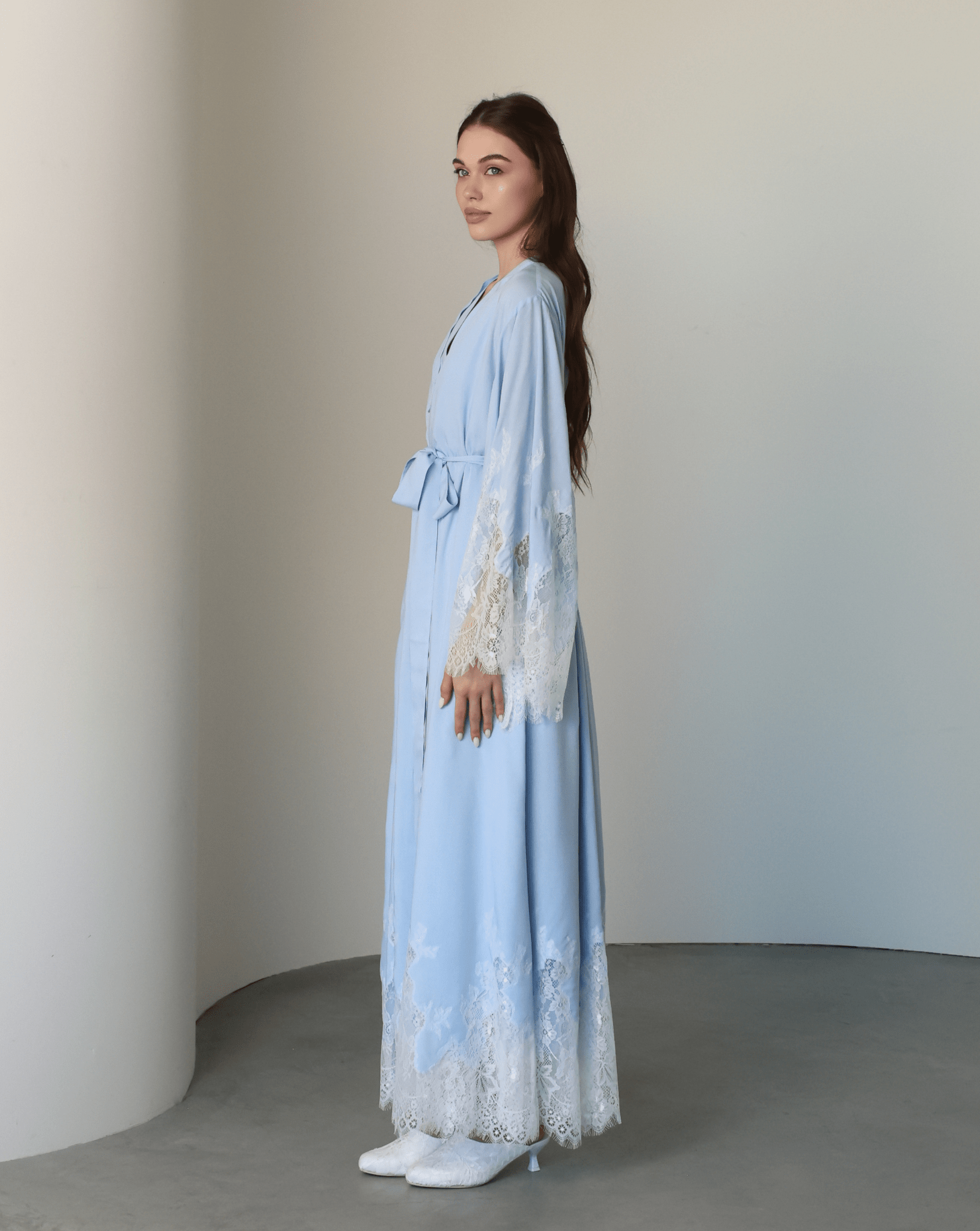 A poised frontal shot of the Robe and Nightgown Set tied with a belt, illustrating a secure and comfortable fit.