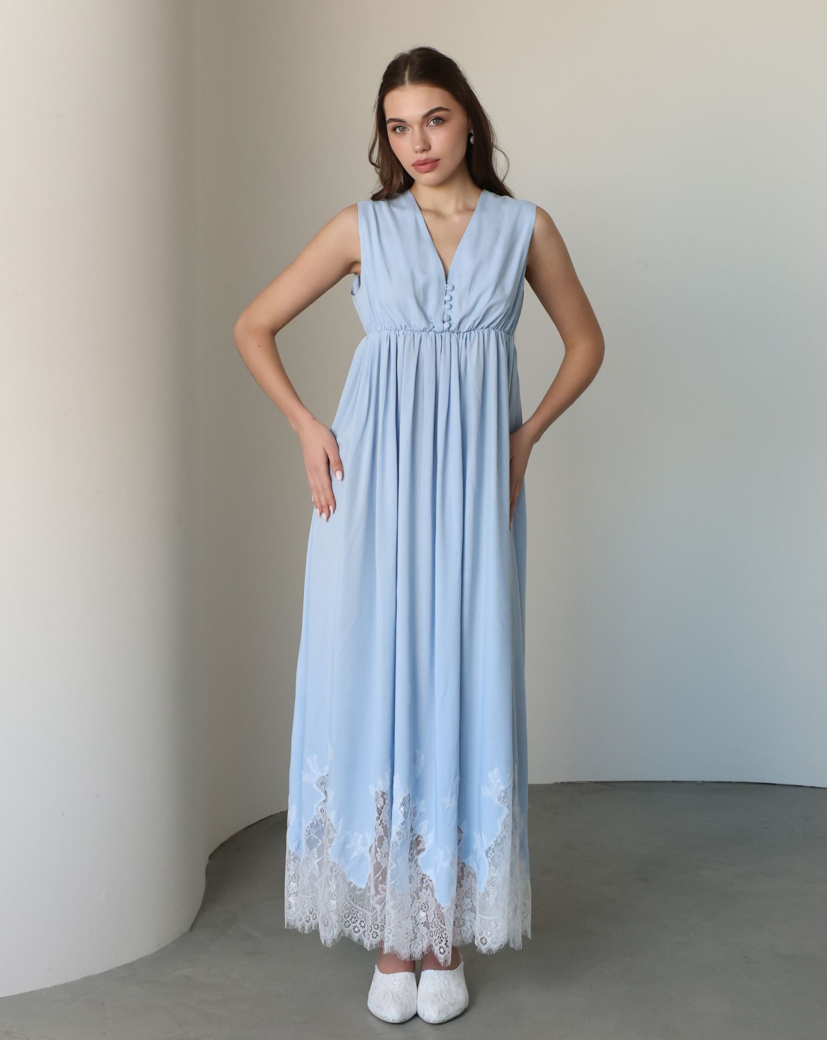 Frontal view of the sleeveless nightgown, featuring hidden front openings for easy and quick nursing access.