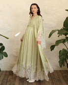 A dynamic frontal view of the Robe and Nightgown Set, capturing the airy movement of the soft cotton blend.