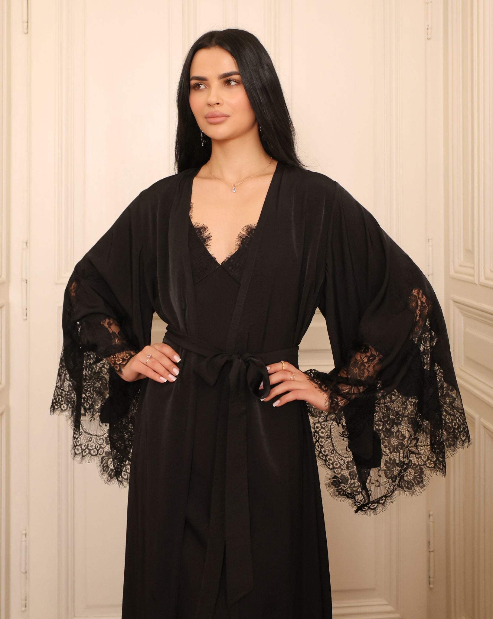 Mid-length shot of the lace ensemble, focusing on the soft cotton-viscose blend and the elegant flow of the sleeves.