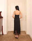 Rear view of the sleeveless nightgown, showcasing the smooth silhouette and thin, light fabric for home relaxation.