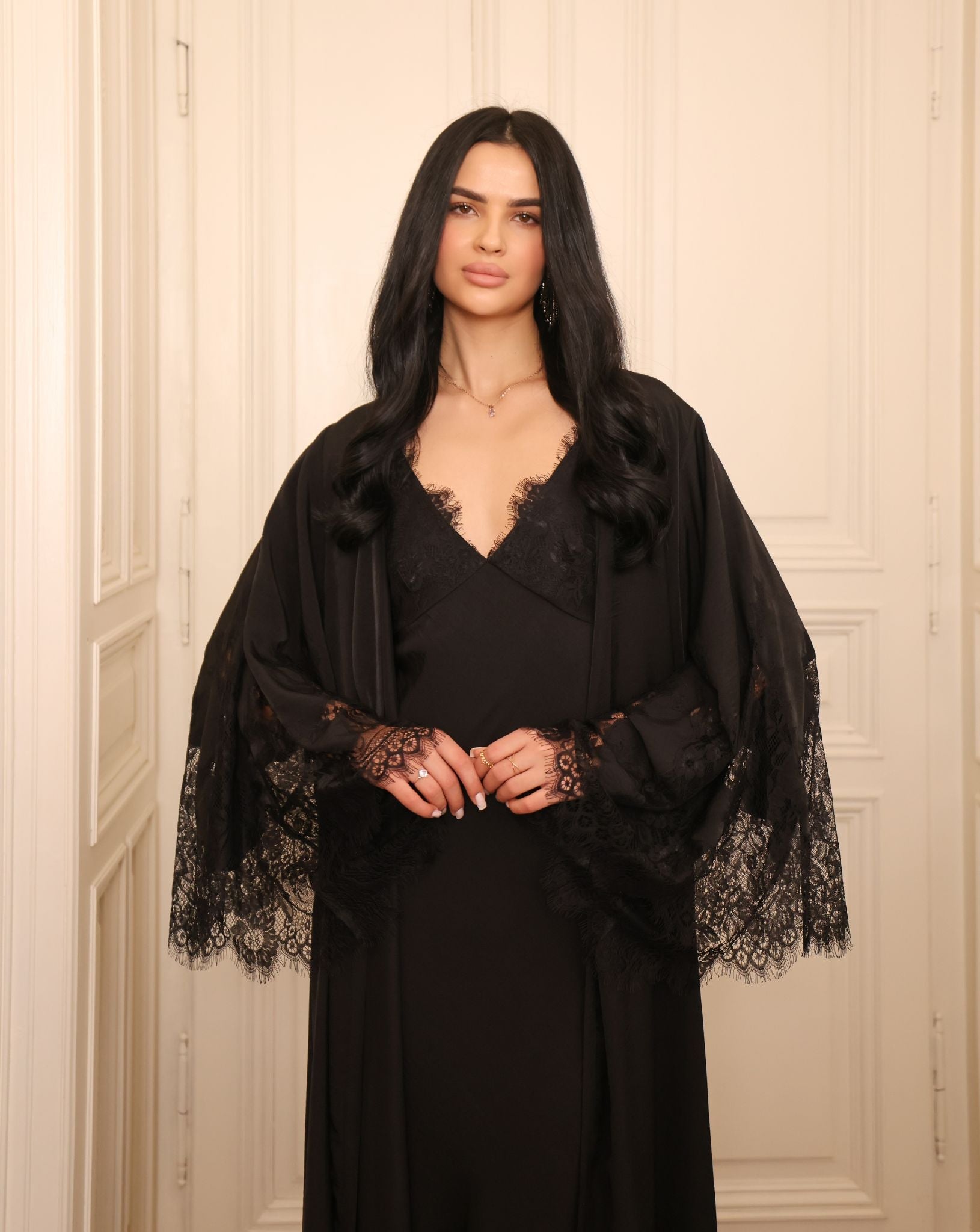 Mid-length view of the wrapped robe, highlighting the adjustable belt and the elegant lace-adorned sleeves.