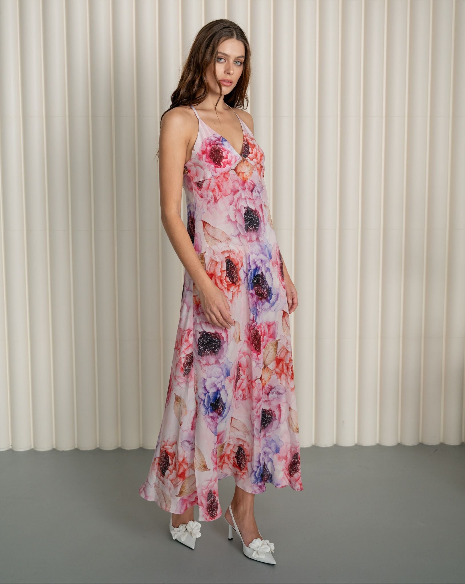 Frontal view of a structured silk crepe nightdress with a romantic peony print and a comfortable, perfect fit.