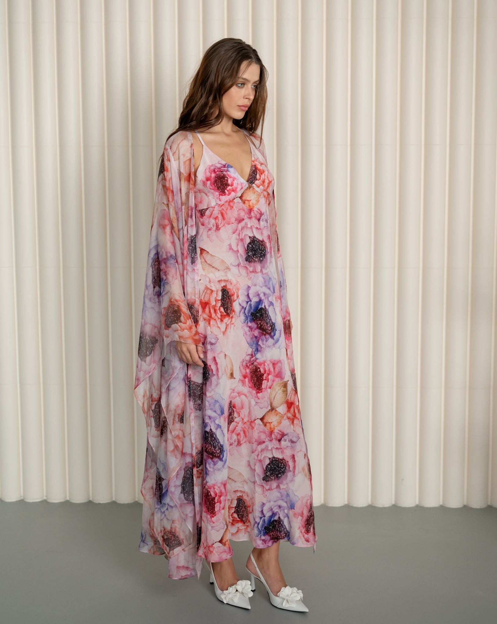 Elegant silk ensemble with dropped shoulders, highlighting the romantic peony print and soft semi-sheer texture.